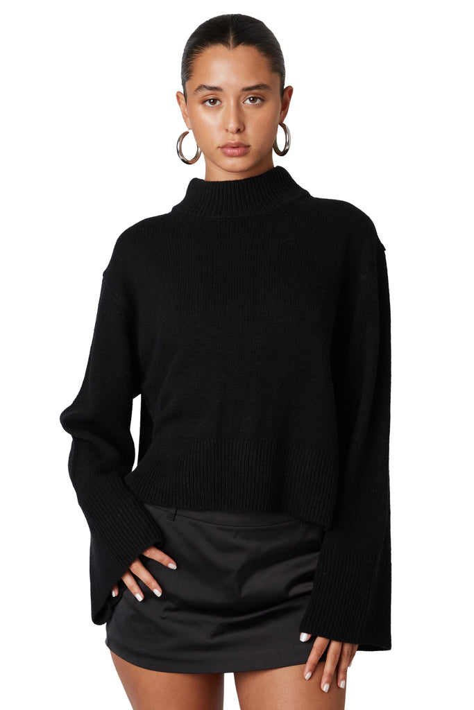 Black funnel neck sweater front