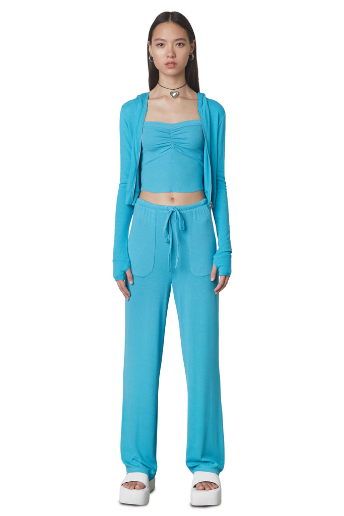 West Lounge Pant in Capri: Mid-rise straight leg lounge pant with elastic waistband and drawstring. Front view.