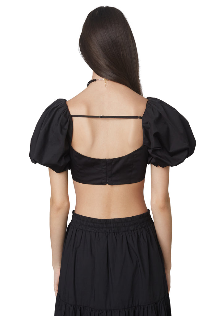 julianne top in black: Puff sleeve fitted crop top with hook and eye closures at back. Fully lined back view