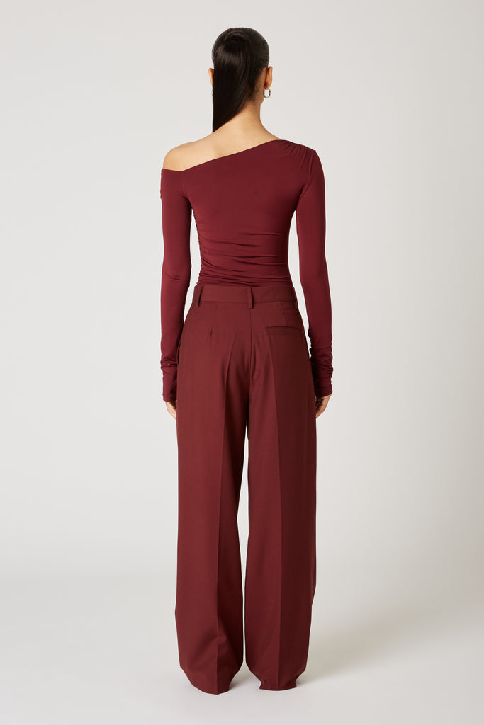 Sly Pant in oxblood back view