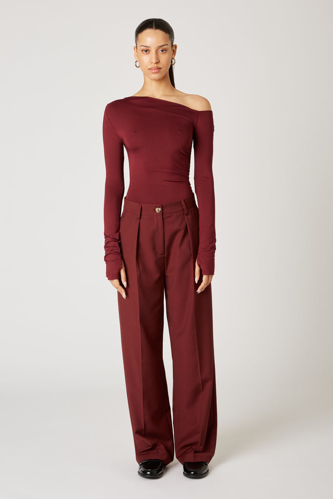 Sly Pant in oxblood front view