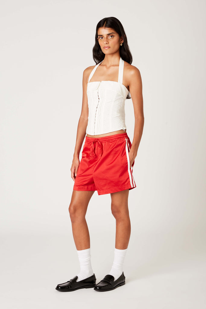 Luis Short in red side view