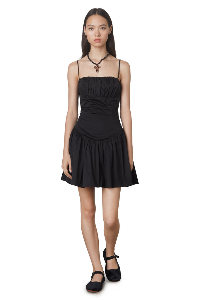 Puglia Dress in black: Poplin drop waist corset mini dress featuring a ruching detail at bust. Fully lined. front view 2