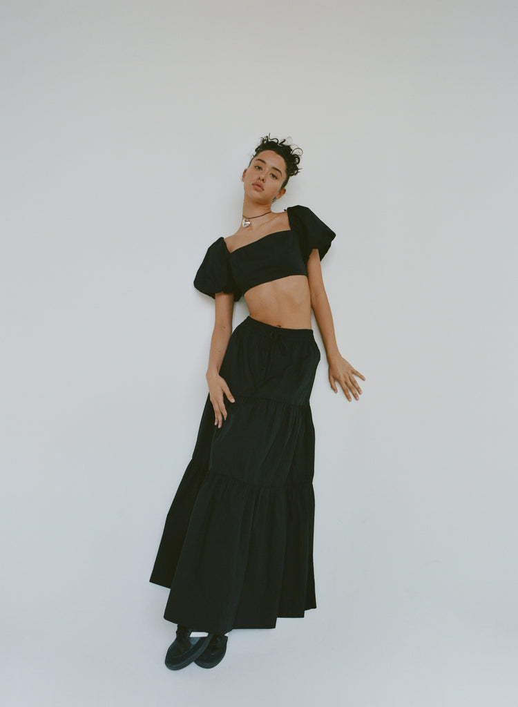 Cora Skirt in black: Peasant style maxi skirt with elastic waist and drawstrings. Fully lined. front view
