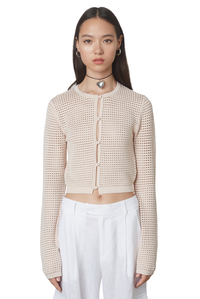 Sofia Cardigan in Natural: Cropped knit cardigan with mesh like knitting and keyhole details. Front view 2