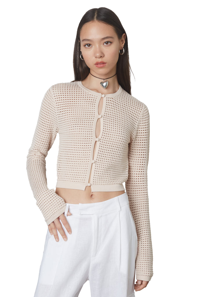 Sofia Cardigan in Natural: Cropped knit cardigan with mesh like knitting and keyhole details. Front view