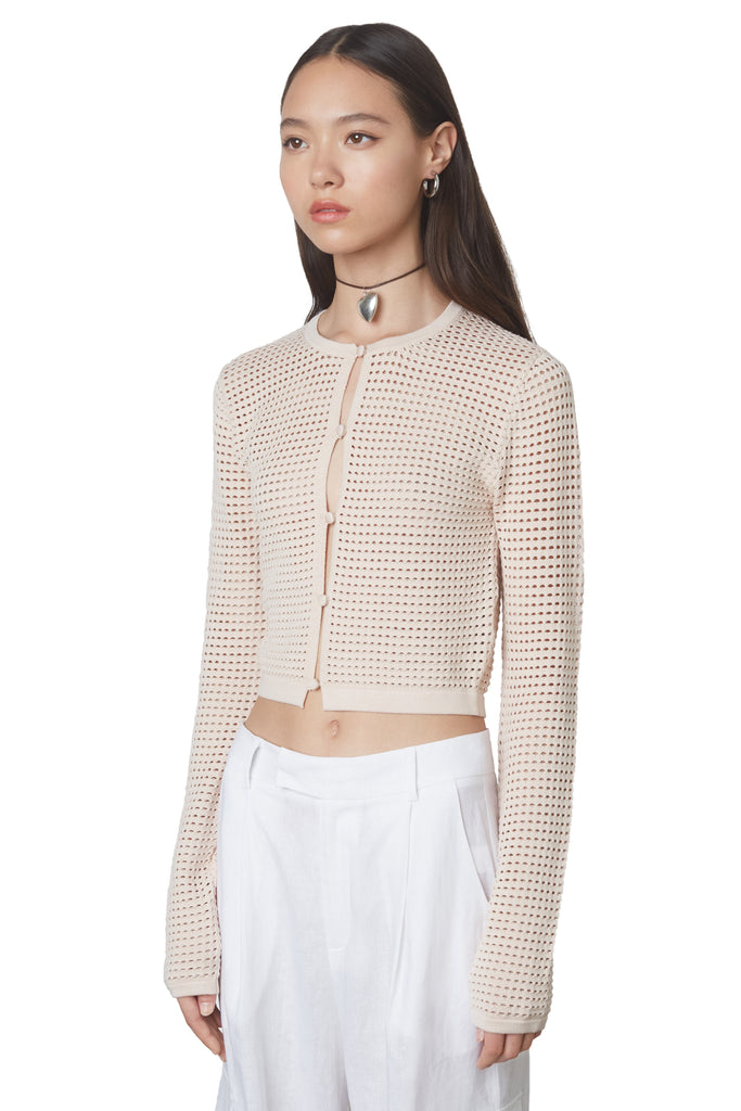 Sofia Cardigan in Natural: Cropped knit cardigan with mesh like knitting and keyhole details. Side view