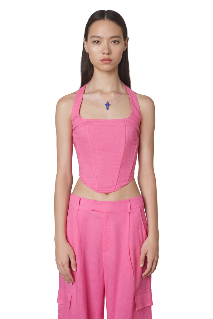 Mia Corset in Pink: Halterneck linen corset with boning and side zipper closure. Front view.