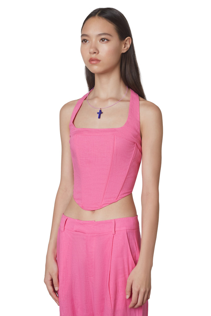 Mia Corset in Pink: Halterneck linen corset with boning and side zipper closure. Side view.