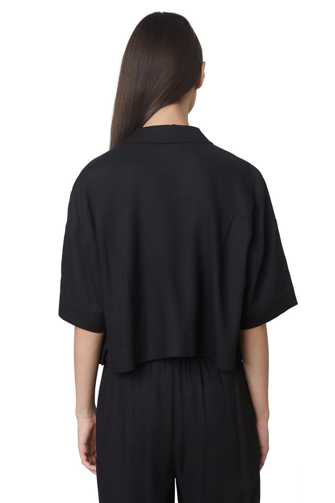 cropped boxy shirt in black: Cropped linen boxy shirt featuring shell buttons back view