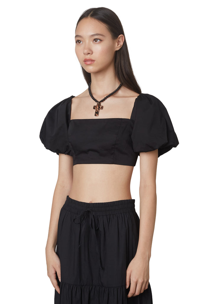 julianne top in black: Puff sleeve fitted crop top with hook and eye closures at back. Fully lined side view