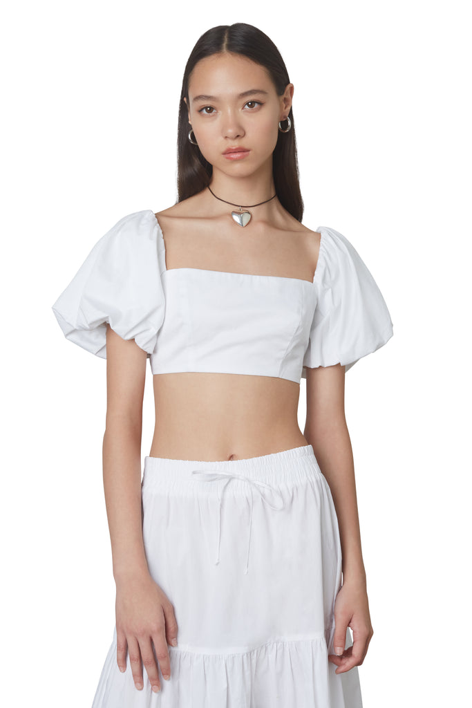julianne top in white: Puff sleeve fitted crop top with hook and eye closures at back. Fully lined front view 2