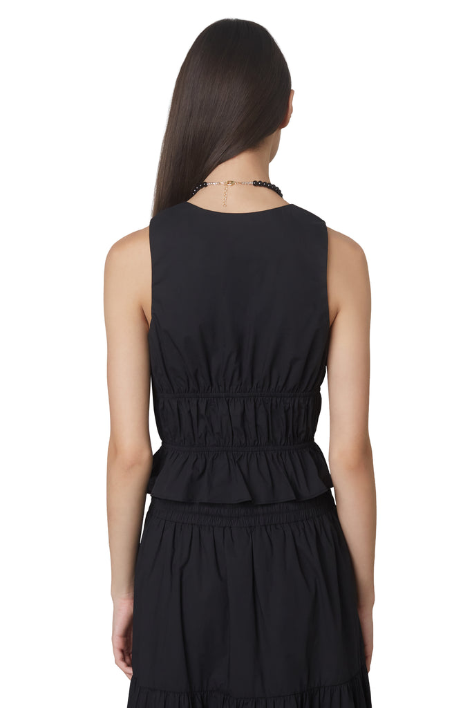 anya top in black: Poplin sleeveless blouse featuring open tie detailing at front and shirring throughout back view