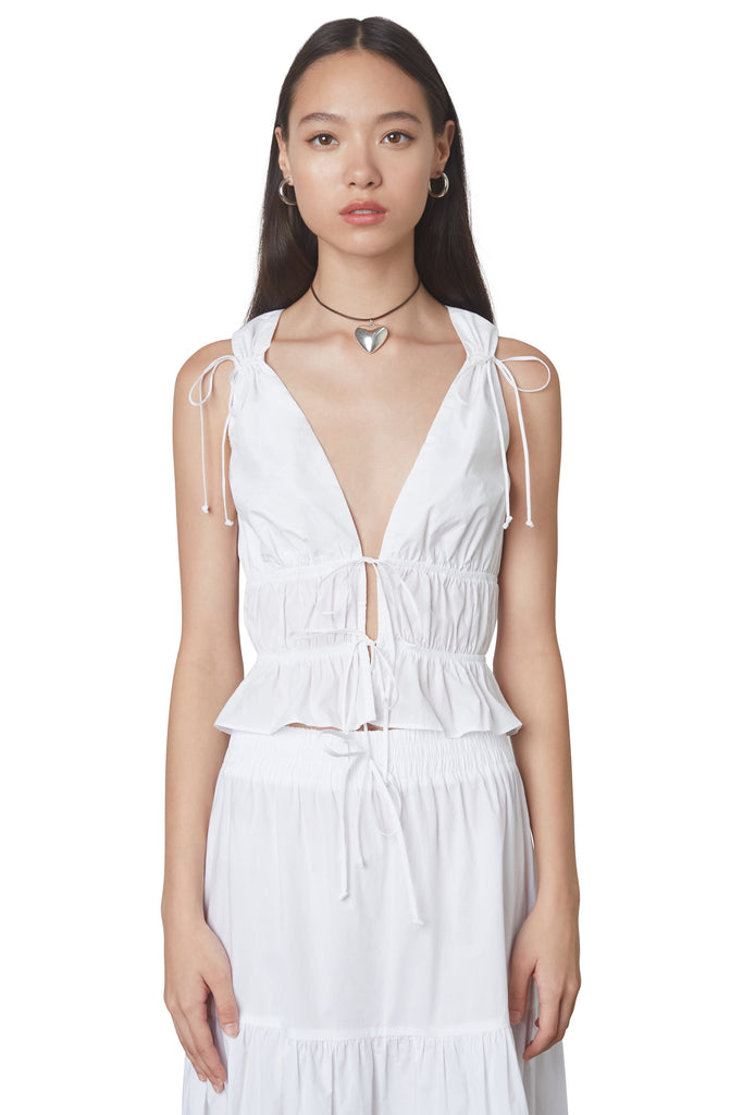 anya top in white: Poplin sleeveless blouse featuring open tie detailing at front and shirring throughout front view