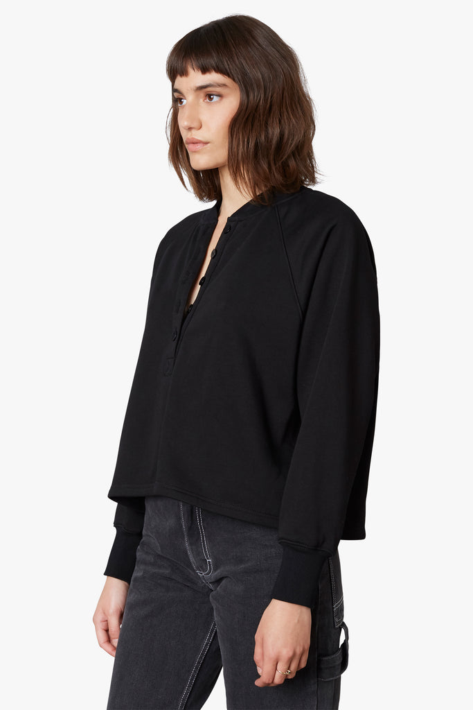 Coco Henley in black, side view