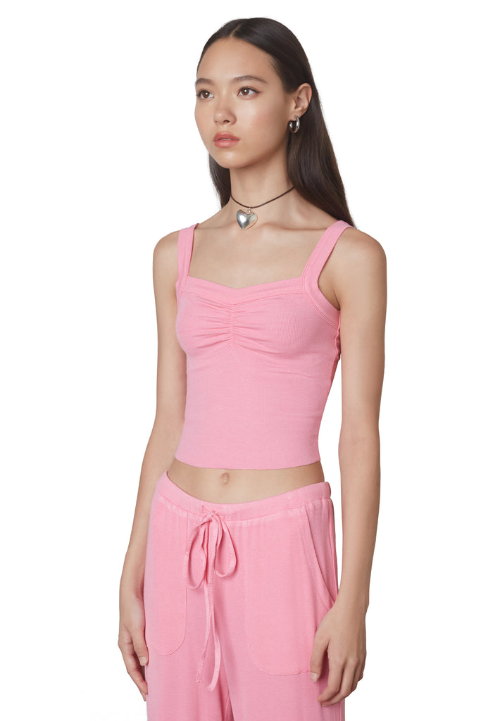 Sweetheart Hacci Tank in Bubblegum: Super soft cropped camisole tank featuring a sweetheart shape neckline and ruching details. Side view.