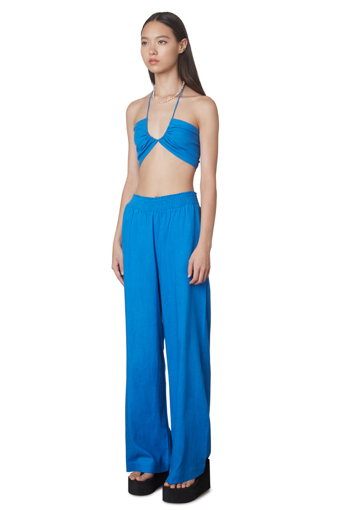 Mallorca set in cobalt blue: Two-piece linen set includes multi-wear crop top and wide legged pull-on linen pant side view